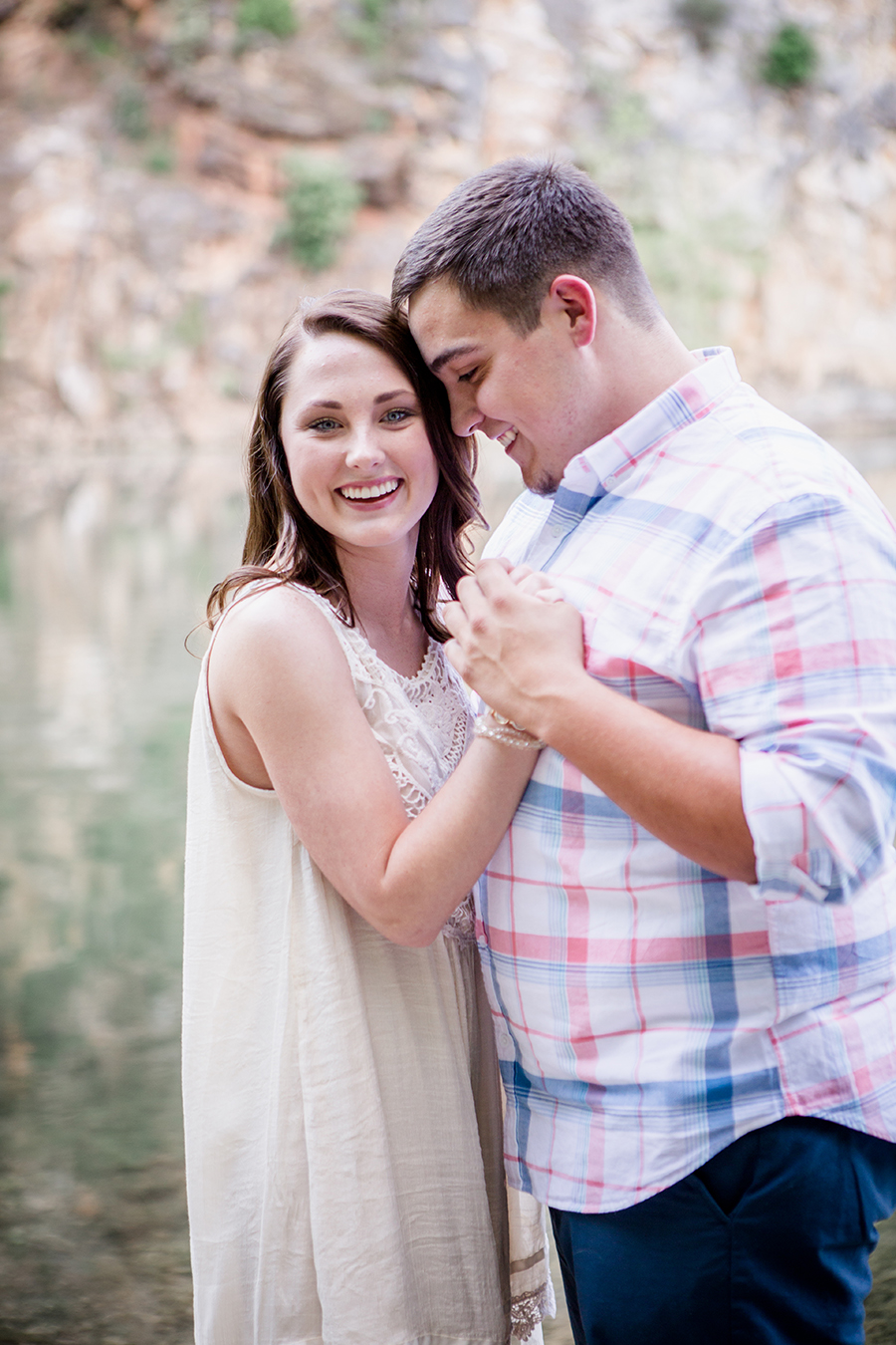 He sings in her ear engagement photo by Knoxville Wedding Photographer, Amanda May Photos.