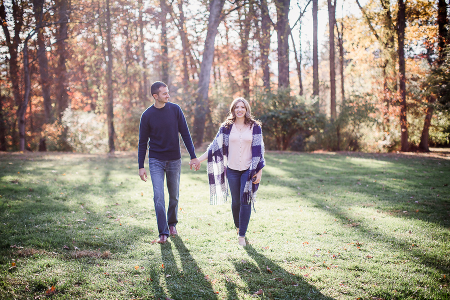 Walking in the sunlight engagement photo by Knoxville Wedding Photographer, Amanda May Photos.