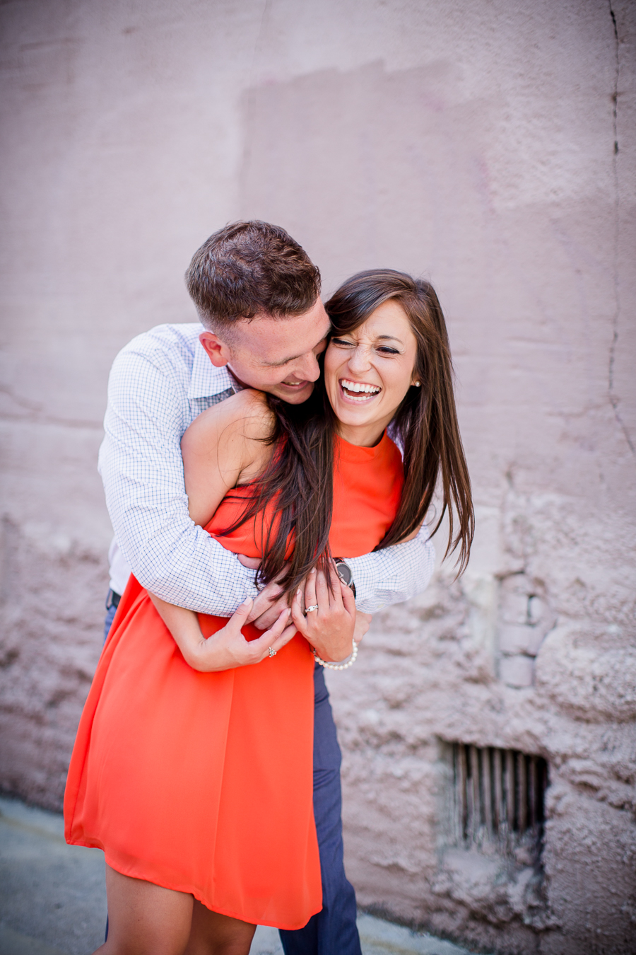 Scares her from behind engagement photo by Knoxville Wedding Photographer, Amanda May Photos.