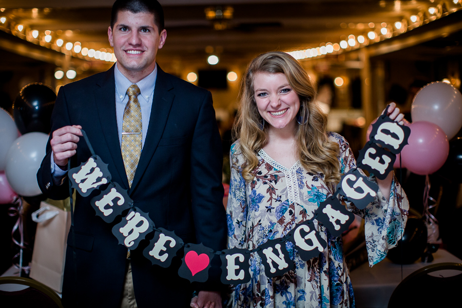 We're engaged banner engagement photo by Knoxville Wedding Photographer, Amanda May Photos.