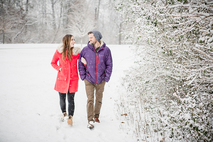 Walking in the snow engagement photo by Knoxville Wedding Photographer, Amanda May Photos.