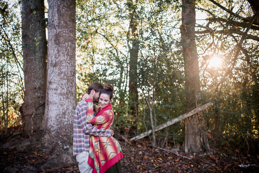 Sun flare snuggles engagement photo by Knoxville Wedding Photographer, Amanda May Photos.