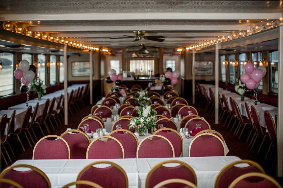Riverboat dining area engagement photo by Knoxville Wedding Photographer, Amanda May Photos.