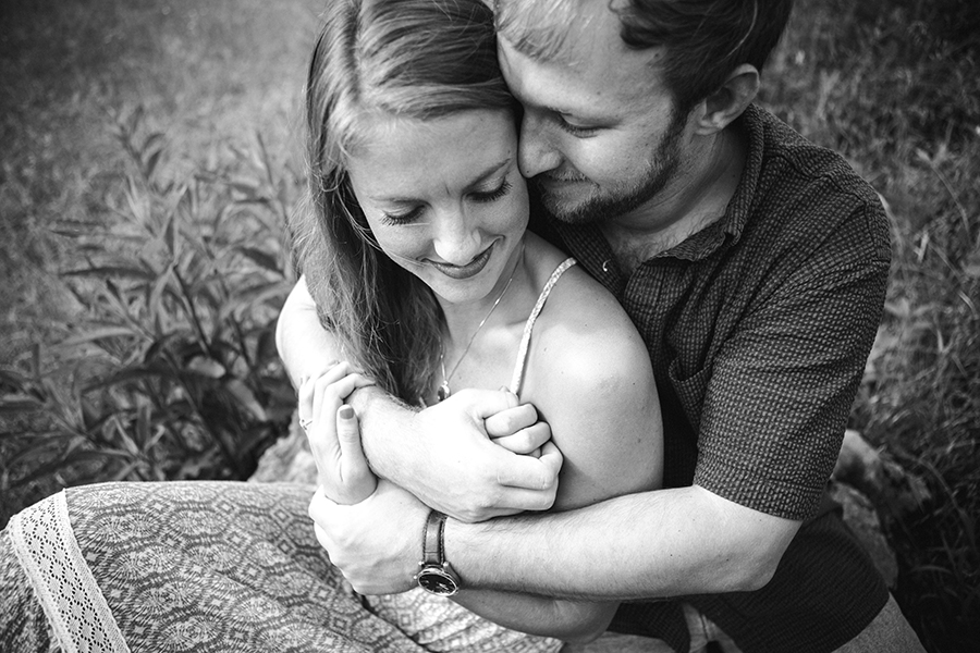 His arms around her chest engagement photo by Knoxville Wedding Photographer, Amanda May Photos.