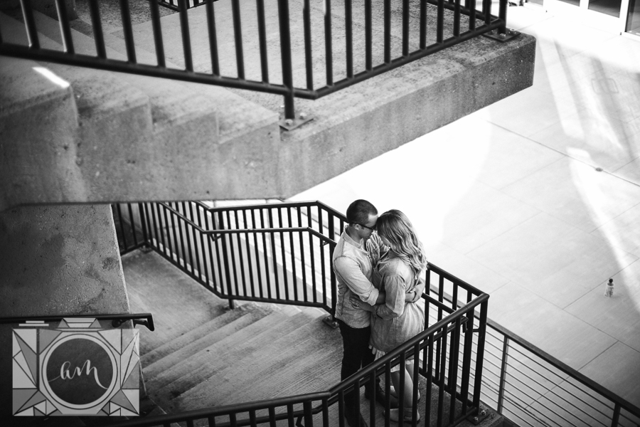 Standing on the corner of the stairs engagement photo by Knoxville Wedding Photographer, Amanda May Photos.