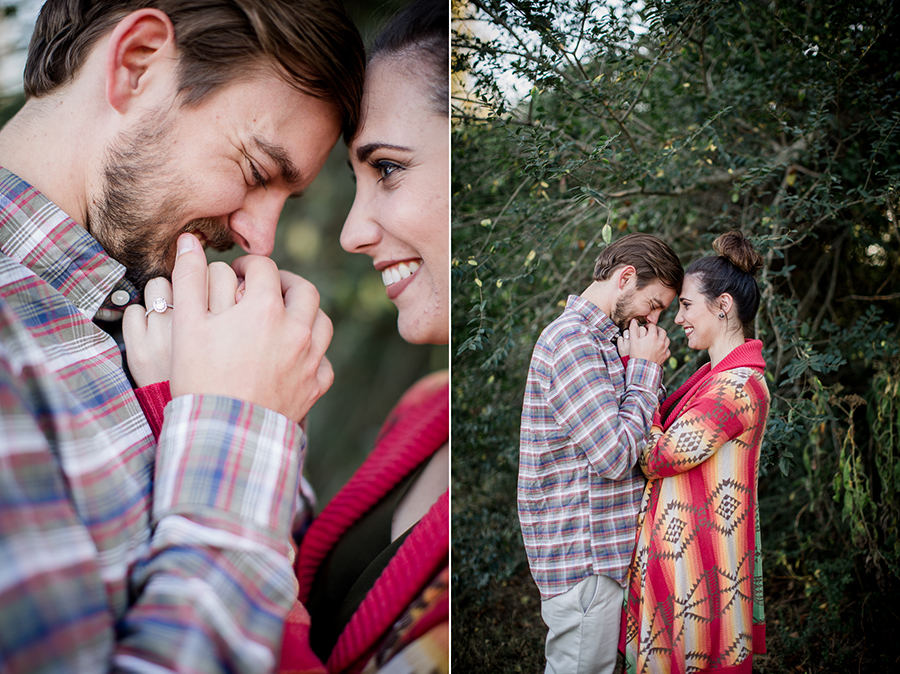 Kissing her hands engagement photo by Knoxville Wedding Photographer, Amanda May Photos.