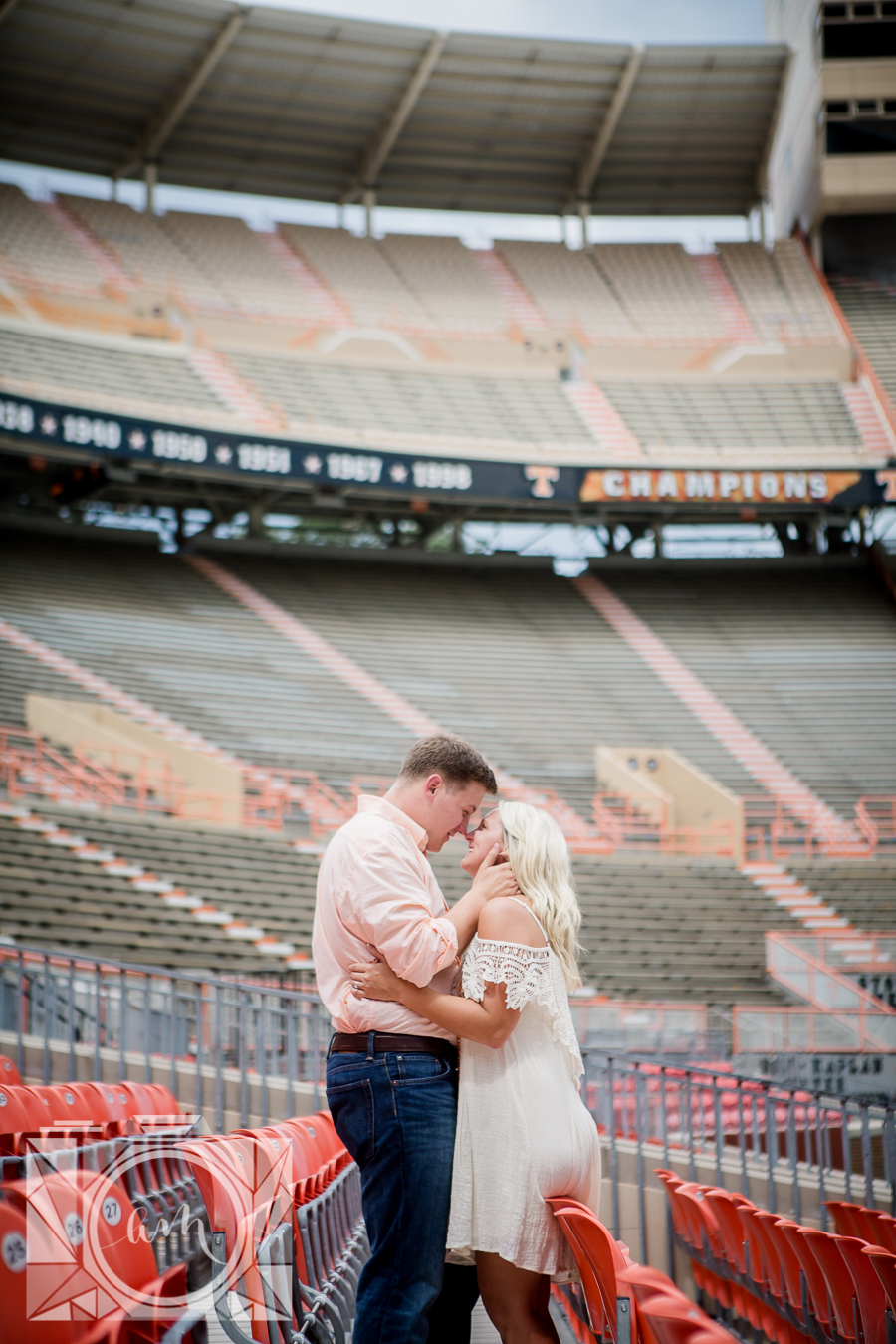 His hand on her cheek engagement photo by Knoxville Wedding Photographer, Amanda May Photos.