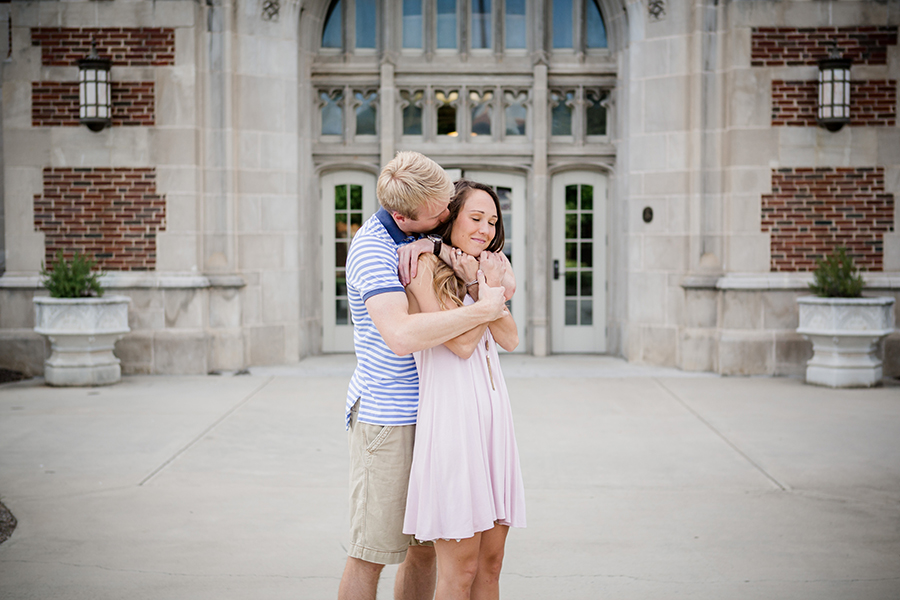 His arms around her neck engagement photo by Knoxville Wedding Photographer, Amanda May Photos.