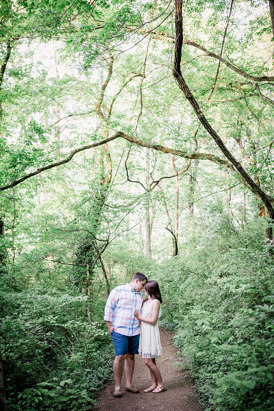Girl on his arm engagement photo by Knoxville Wedding Photographer, Amanda May Photos.