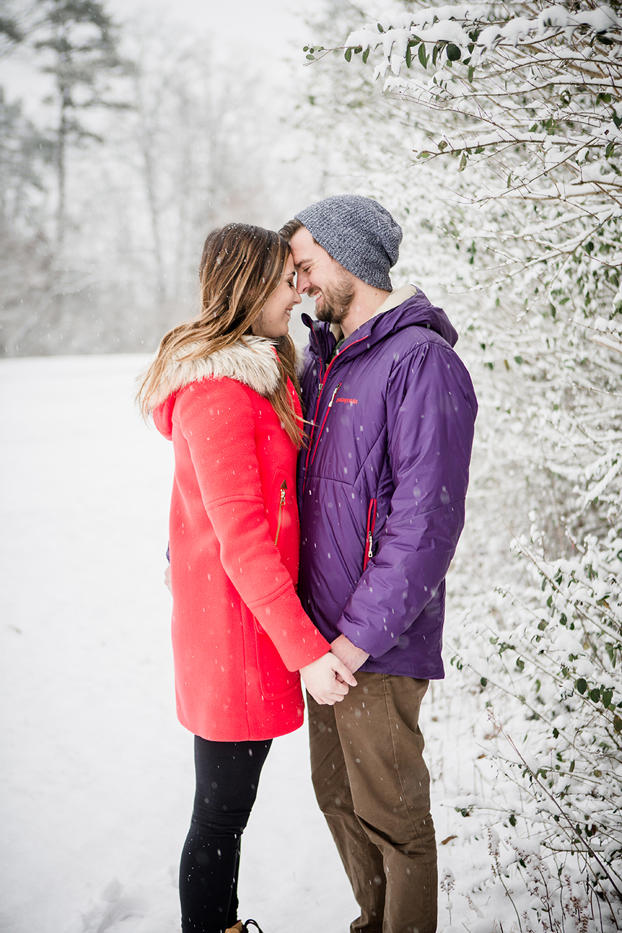Snowy foreheads together engagement photo by Knoxville Wedding Photographer, Amanda May Photos.