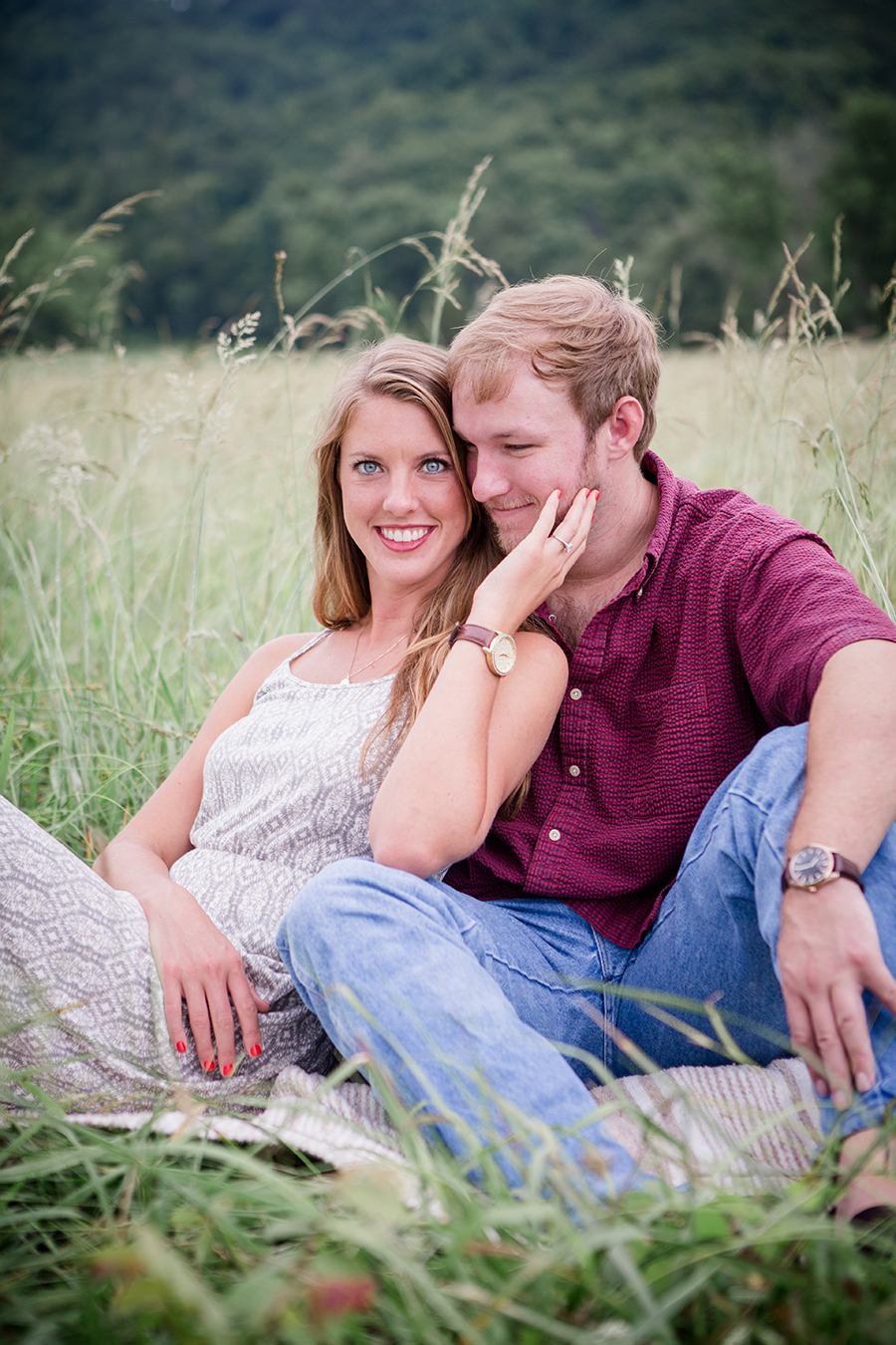 Leaning back against his chest engagement photo by Knoxville Wedding Photographer, Amanda May Photos.