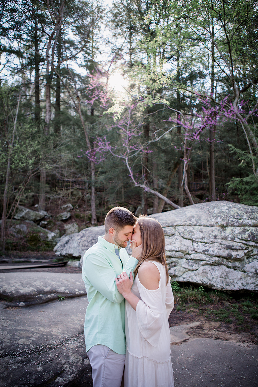 Her arms on his forearms engagement photo by Knoxville Wedding Photographer, Amanda May Photos.