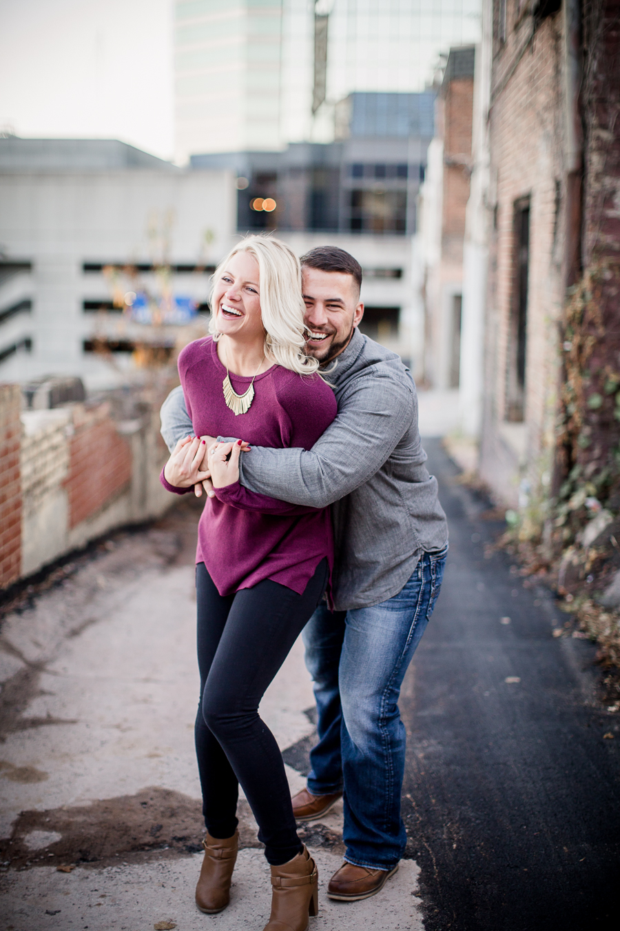 He scared her from behind engagement photo by Knoxville Wedding Photographer, Amanda May Photos.