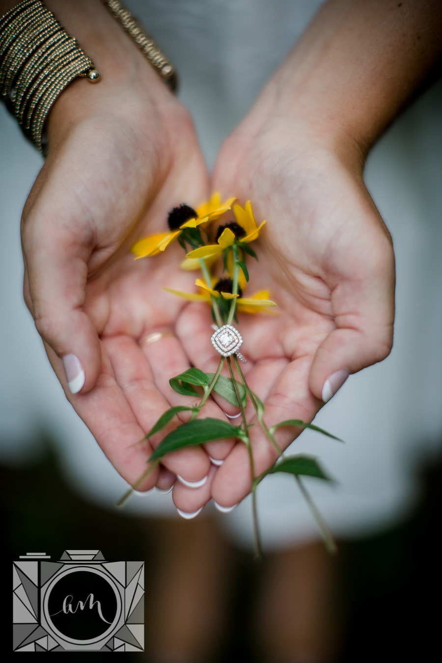 Yellow wildflowers with engagement ring engagement photo by Knoxville Wedding Photographer, Amanda May Photos.