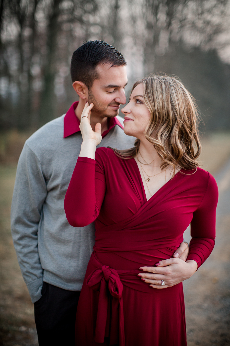 Reaching around with his face engagement photo by Knoxville Wedding Photographer, Amanda May Photos.