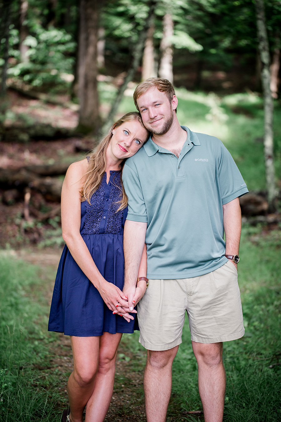 Their heads leaning into each other engagement photo by Knoxville Wedding Photographer, Amanda May Photos.