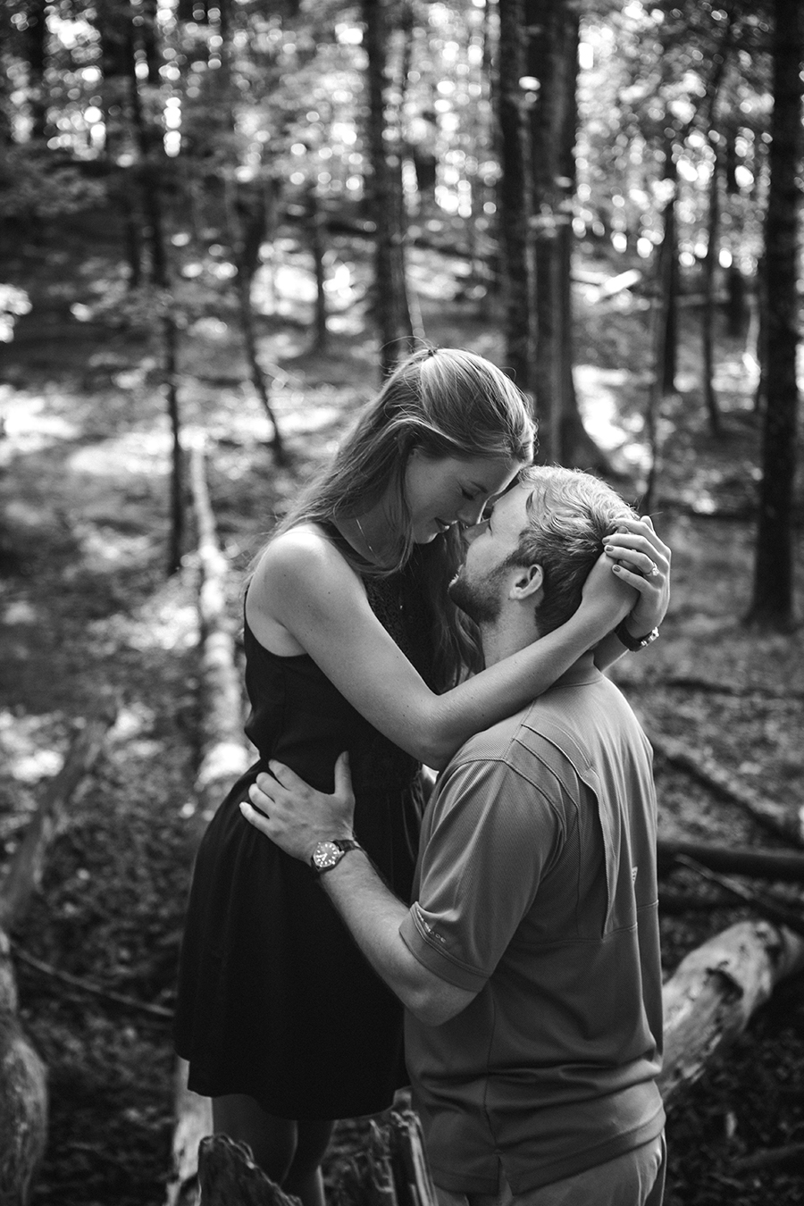 Her hands cupping his head engagement photo by Knoxville Wedding Photographer, Amanda May Photos.
