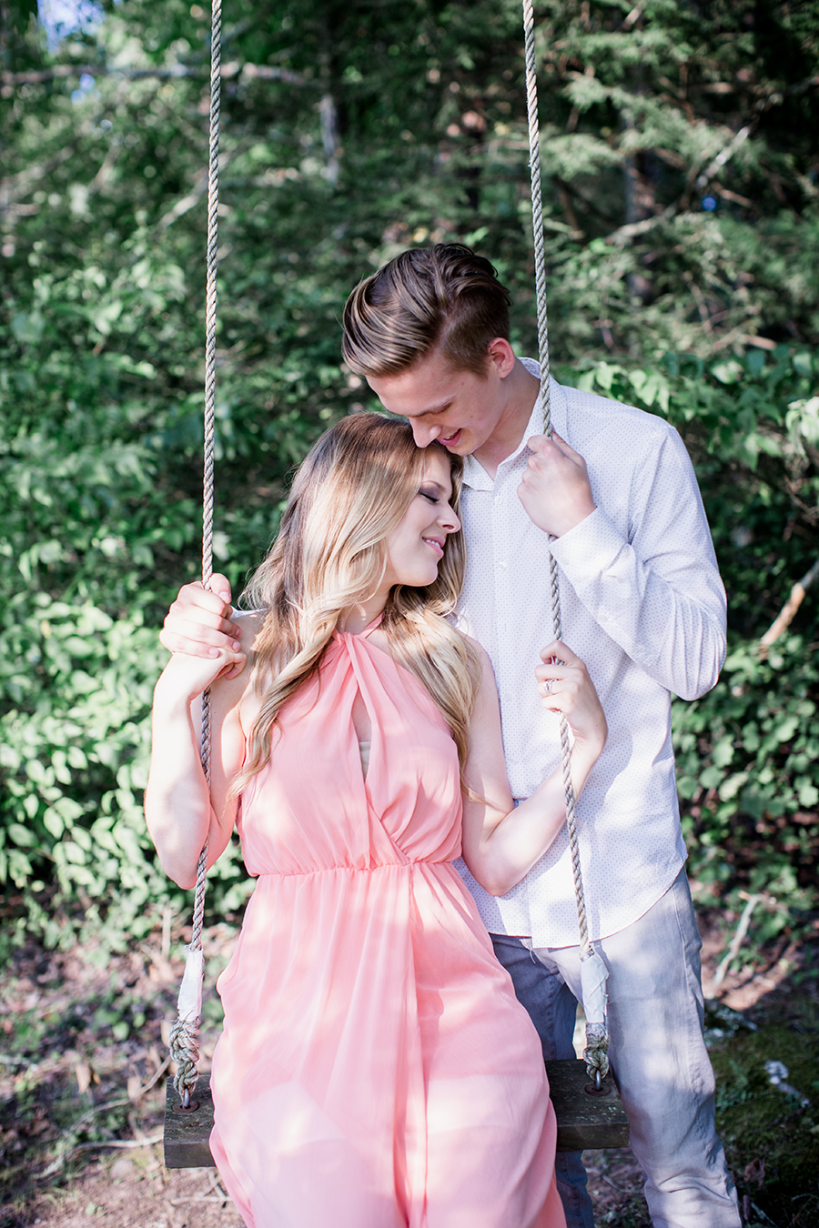 Sitting on a tree swing by Knoxville Wedding Photographer, Amanda May Photos.
