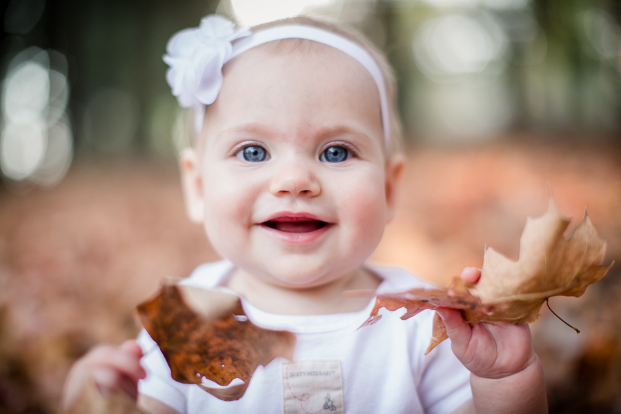 Playing with leaves by Knoxville Wedding Photographer, Amanda May Photos.