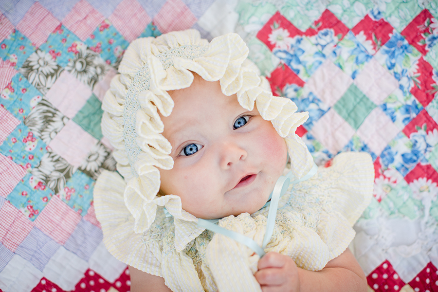 Blue eyes in a bonnet by Knoxville Wedding Photographer, Amanda May Photos.