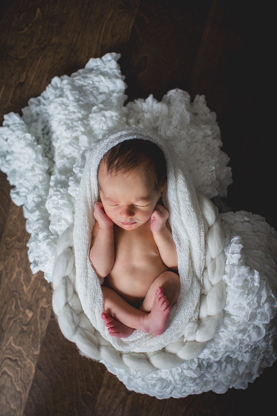 Swaddled in a basket by Knoxville Wedding Photographer, Amanda May Photos.