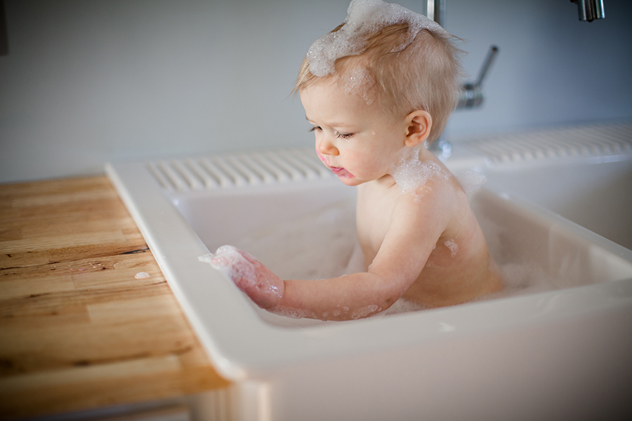 Sink bath with bubbles by Knoxville Wedding Photographer, Amanda May Photos.