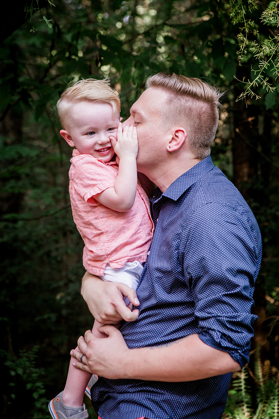 Dad kissing son's cheek by Knoxville Wedding Photographer, Amanda May Photos.
