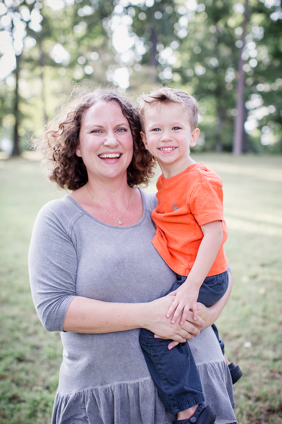 Mom holding son on her hip by Knoxville Wedding Photographer, Amanda May Photos.