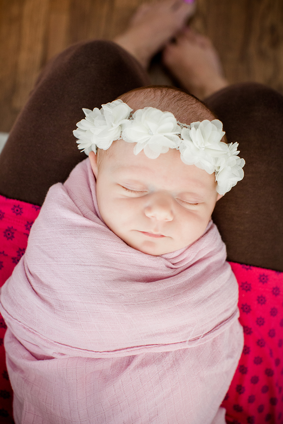Swaddled with white flower crown by Knoxville Wedding Photographer, Amanda May Photos.