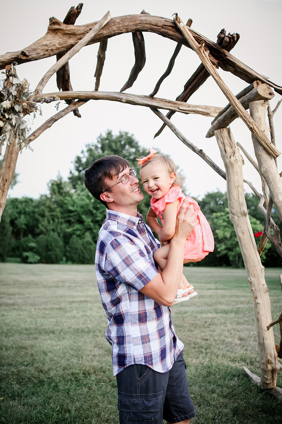 Daddy and daughter in the air by Knoxville Wedding Photographer, Amanda May Photos.