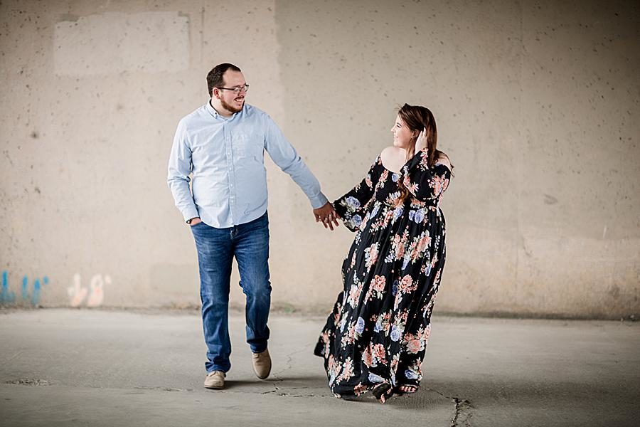 Holding hands at this 2018 favorite engagements by Knoxville Wedding Photographer, Amanda May Photos.
