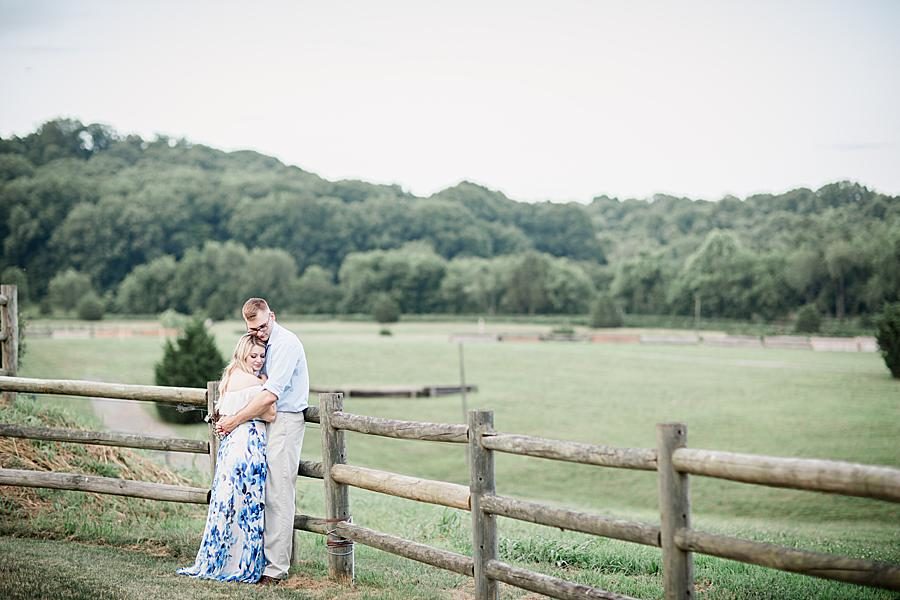Pasture fence at this 2018 favorite engagements by Knoxville Wedding Photographer, Amanda May Photos.