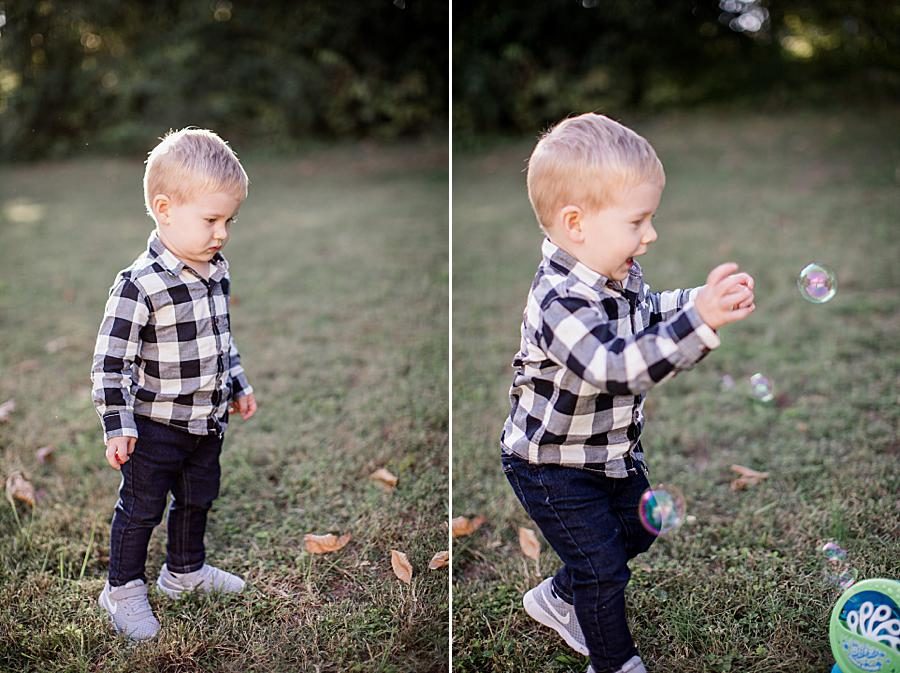 Playing in the yard at this Family by Knoxville Wedding Photographer, Amanda May Photos.