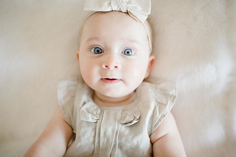 Blue eyed baby at this Lifestyle 6 Month Session by Knoxville Wedding Photographer, Amanda May Photos.