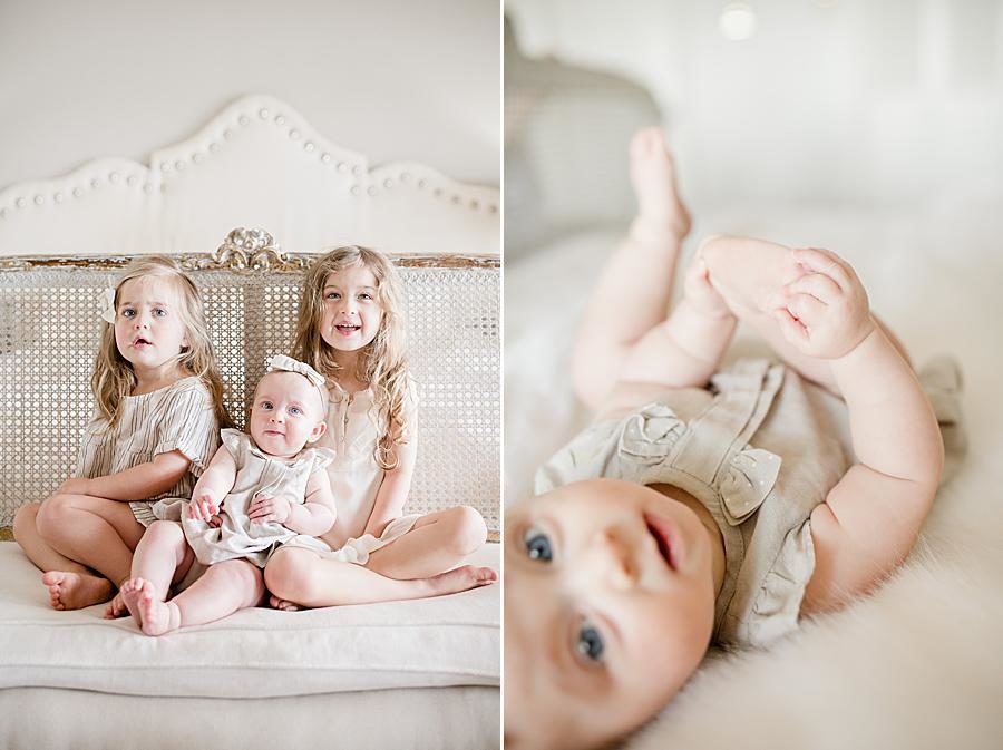 Looking at the camera at this Lifestyle 6 Month Session by Knoxville Wedding Photographer, Amanda May Photos.