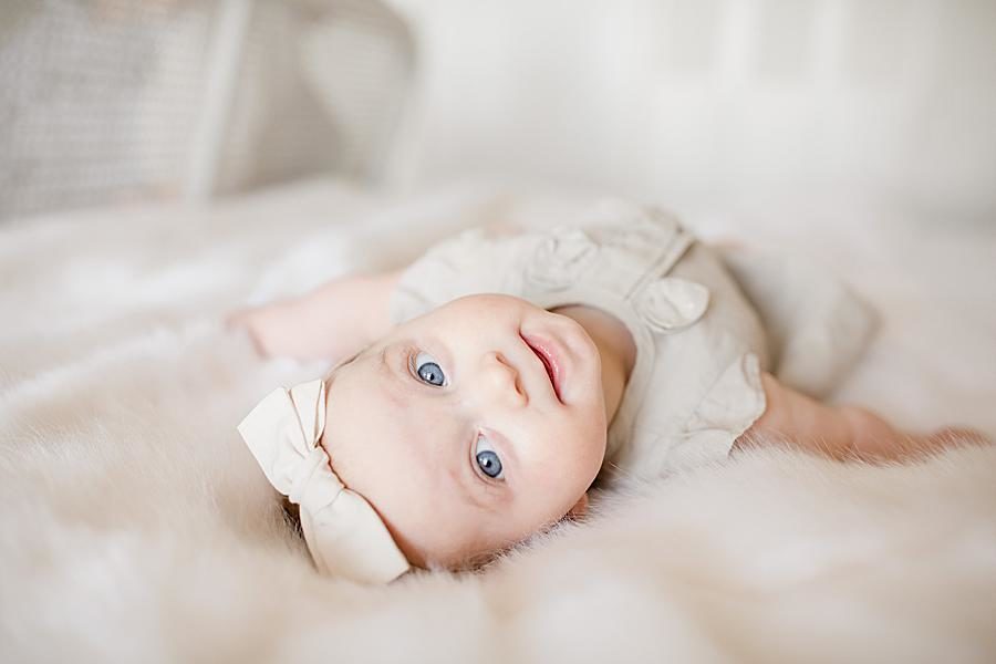 White bow at this Lifestyle 6 Month Session by Knoxville Wedding Photographer, Amanda May Photos.