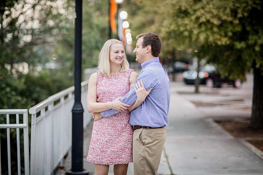 On the sidewalk at this Volunteer Landing Engagement Session by Knoxville Wedding Photographer, Amanda May Photos.