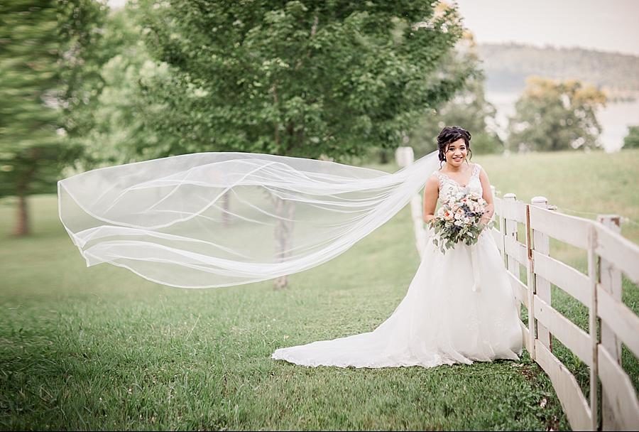 Veil flowing in the wind at this Whitestone Country Inn bridal session by Knoxville Wedding Photographer, Amanda May Photos.
