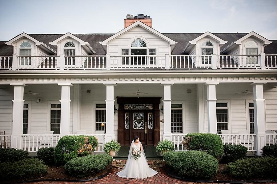 In front of the inn at this Whitestone Country Inn bridal session by Knoxville Wedding Photographer, Amanda May Photos.