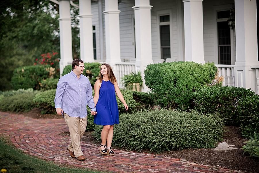 Holding hands at this Whitestone Country Inn Engagement Session by Knoxville Wedding Photographer, Amanda May Photos.