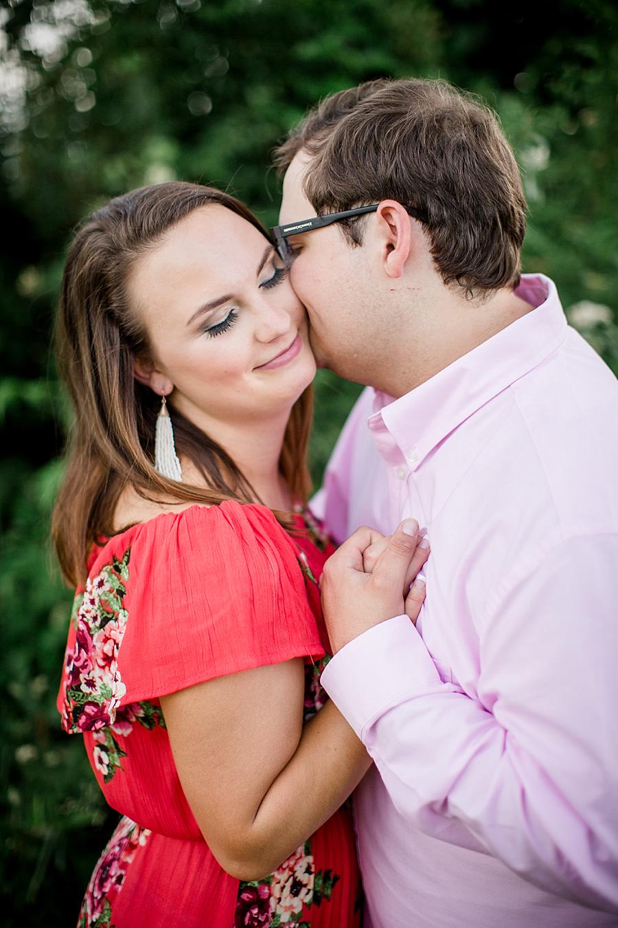 Kiss on the cheek at this Whitestone Country Inn Engagement Session by Knoxville Wedding Photographer, Amanda May Photos.