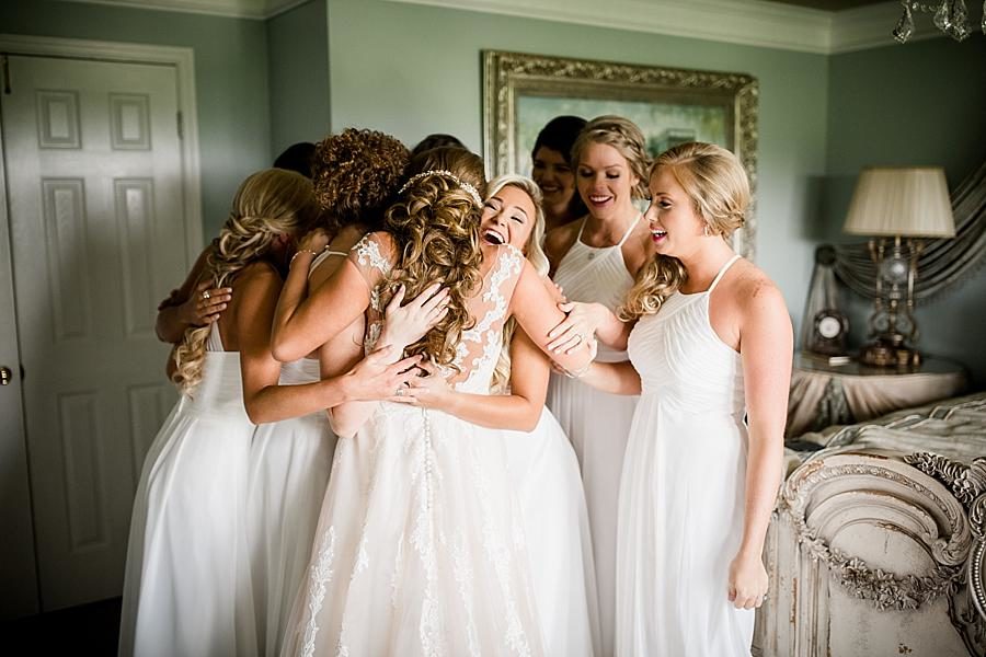 Hugging at this Castleton Farms Wedding by Knoxville Wedding Photographer, Amanda May Photos.