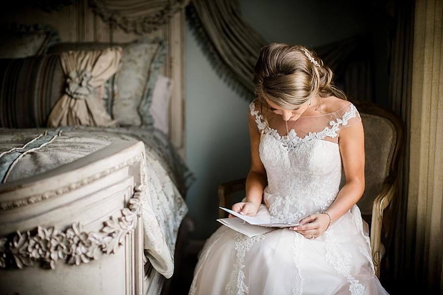 Reading a letter at this Castleton Farms Wedding by Knoxville Wedding Photographer, Amanda May Photos.