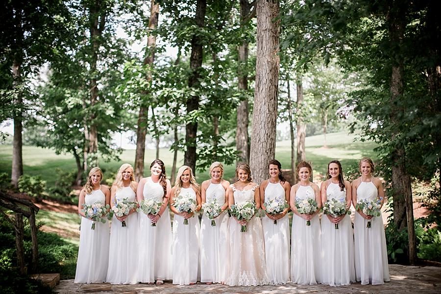 Bridesmaids among the trees at this Castleton Farms Wedding by Knoxville Wedding Photographer, Amanda May Photos.