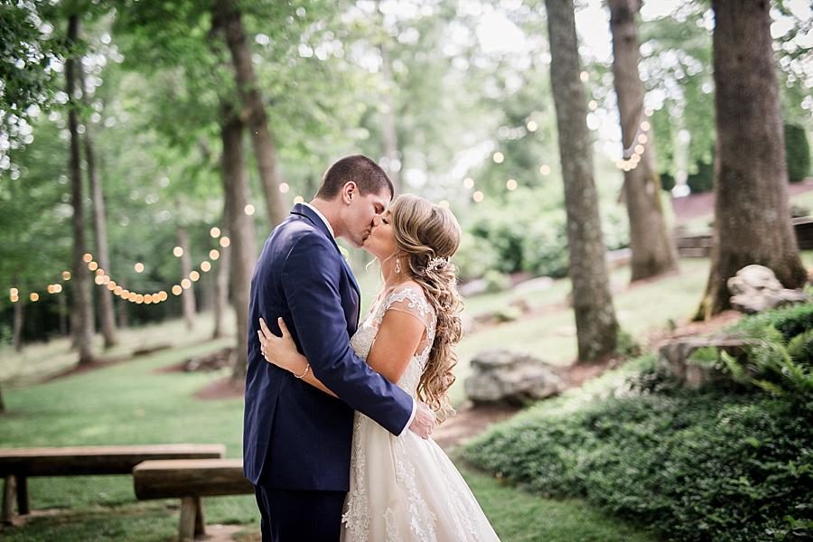 Kisses at this Castleton Farms Wedding by Knoxville Wedding Photographer, Amanda May Photos.