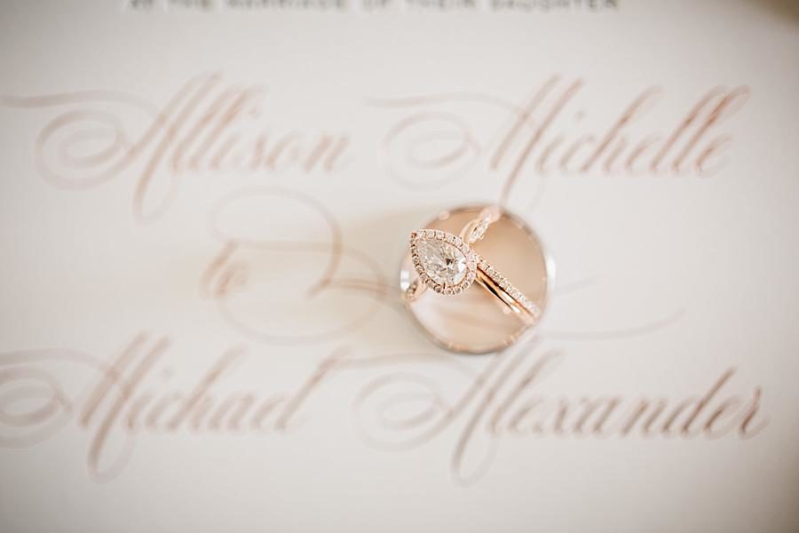 Rings on the invitation at this Castleton Farms Wedding by Knoxville Wedding Photographer, Amanda May Photos.