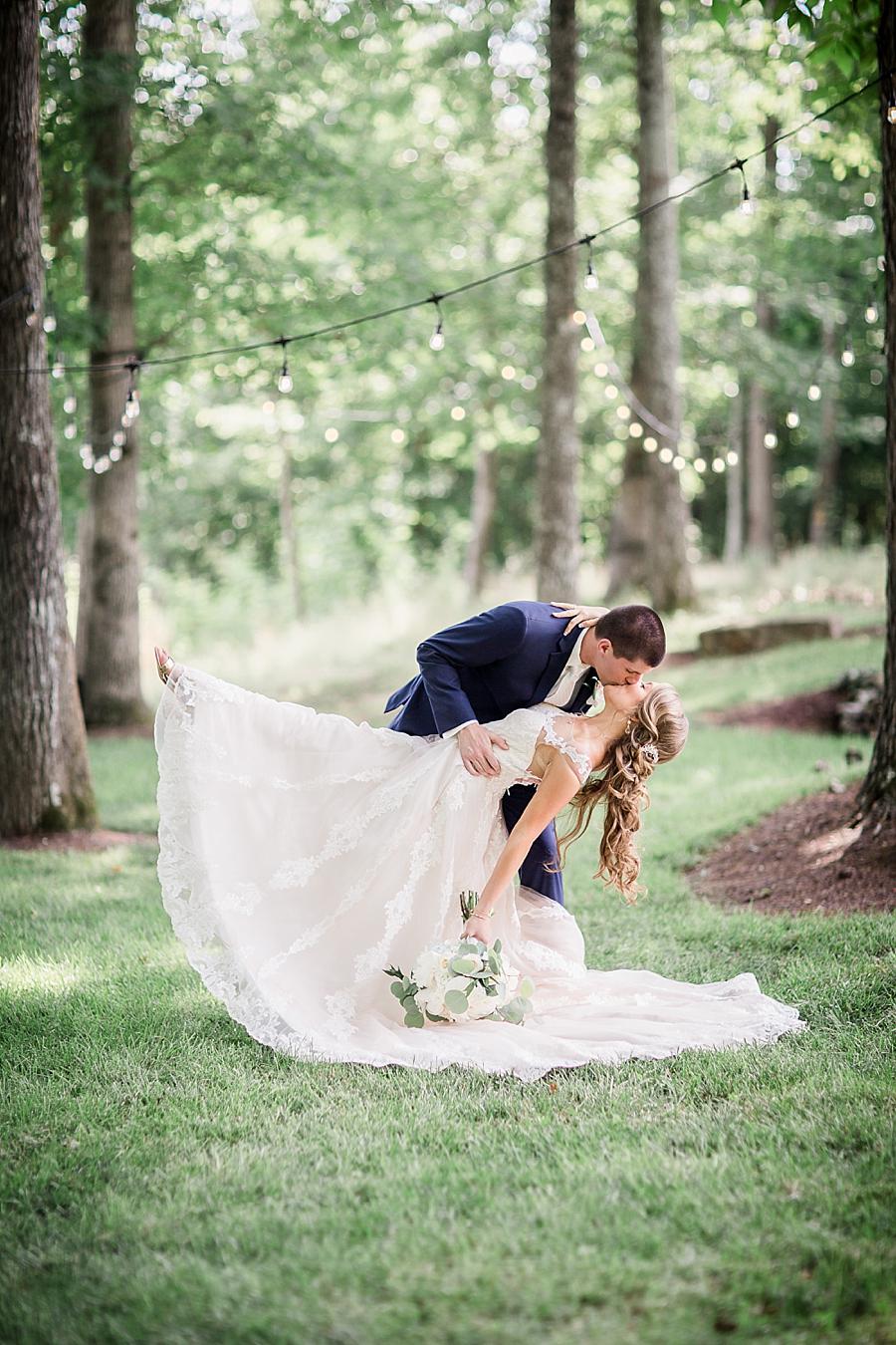 Deep dip kiss at this Castleton Farms Wedding by Knoxville Wedding Photographer, Amanda May Photos.