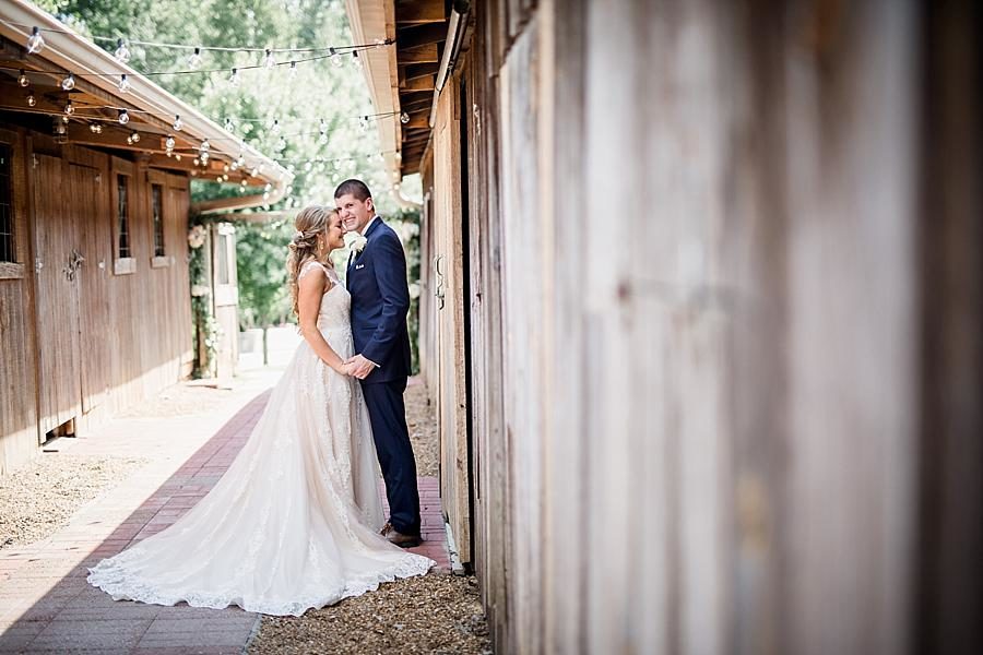 Beside the stables at this Castleton Farms Wedding by Knoxville Wedding Photographer, Amanda May Photos.