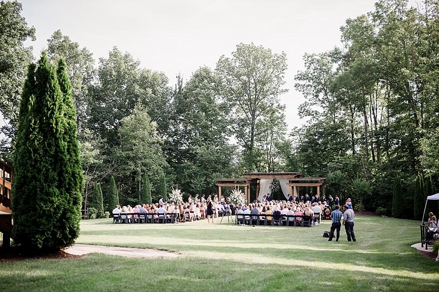 Ceremony from a distance at this Castleton Farms Wedding by Knoxville Wedding Photographer, Amanda May Photos.