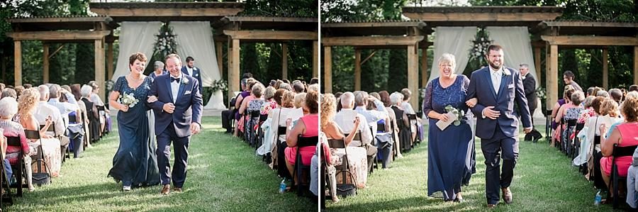 Parents leaving the ceremony at this Castleton Farms Wedding by Knoxville Wedding Photographer, Amanda May Photos.